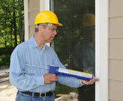 Technican-sealing-air-leaks air leaks in your home, Boston, Brook Farm MA